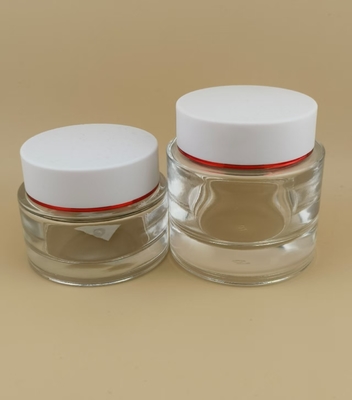 Transparante glazen crème pot met witte schroefdeksel voor dameslotion