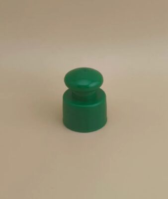 Groene plastic gladde dop met knop voor cosmetische flessen