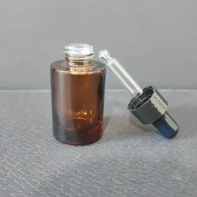Op maat gemaakte luxe heldere lege glazen fles Op maat gemaakte kleur 15 ml essentiële olie dropper fles