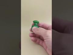 Groene plastic gladde dop met knop voor cosmetische flessen