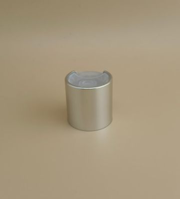 Zilveren aluminium-plastiek ronde gladde dop met heldere knop voor huidverzorgingsflessen