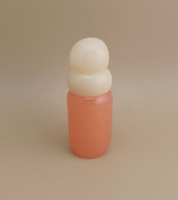 Roze glazen fles met rijswitte dop voor meisjesparfum