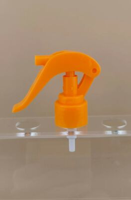 Oranje kunststof mini-triggerspuit voor kappers