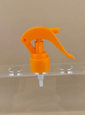 Oranje kunststof mini-triggerspuit voor kappers