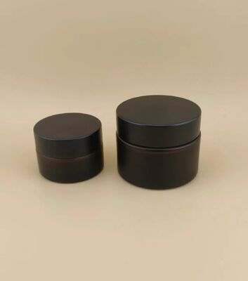 Mooi ontworpen zwarte glazen crème pot met schroefdeksel voor lotion