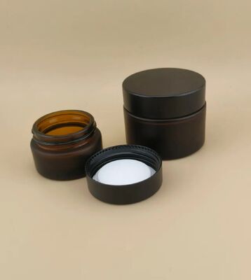 Mooi ontworpen zwarte glazen crème pot met schroefdeksel voor lotion
