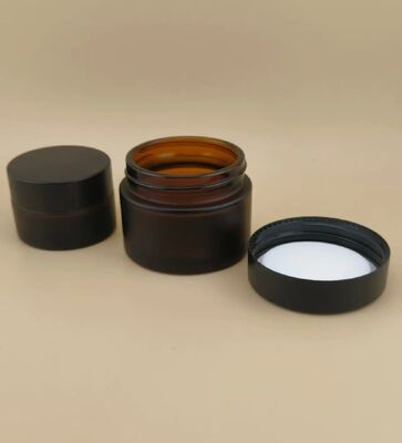 Mooi ontworpen zwarte glazen crème pot met schroefdeksel voor lotion