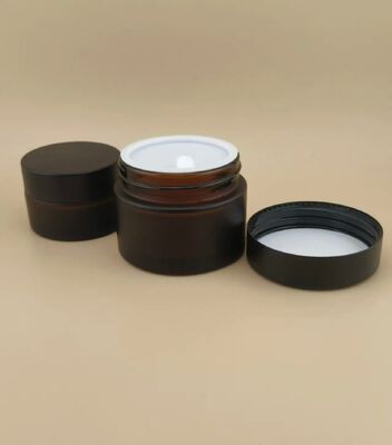 Mooi ontworpen zwarte glazen crème pot met schroefdeksel voor lotion