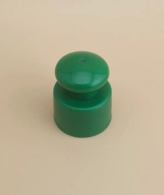Groene plastic gladde dop met knop voor cosmetische flessen
