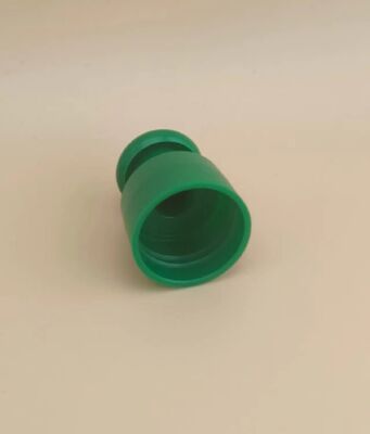 Groene plastic gladde dop met knop voor cosmetische flessen