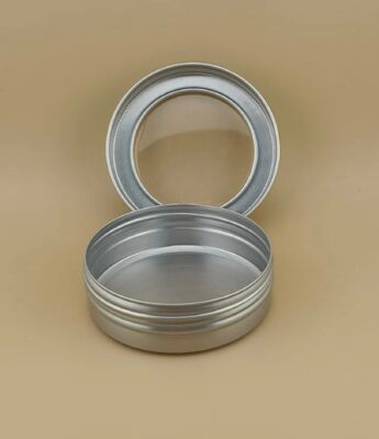 Grote zilverkleurige aluminium behuizing met doorzichtige schroefdop voor cosmetica