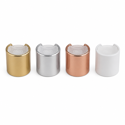 Gouden aluminium-plastiek ronde gladde dop met heldere knop voor huidverzorgingsflessen